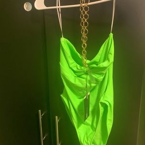 Lime green one piece swimsuit.